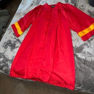 Red and gold men or women’s graduation gown
